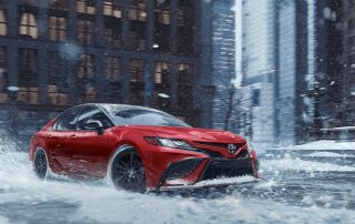 Toyota in snowy urban area - 2022 Camry price concept