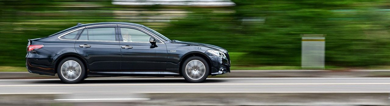 Toyota Crown driving - Toyota vs Honda concept image