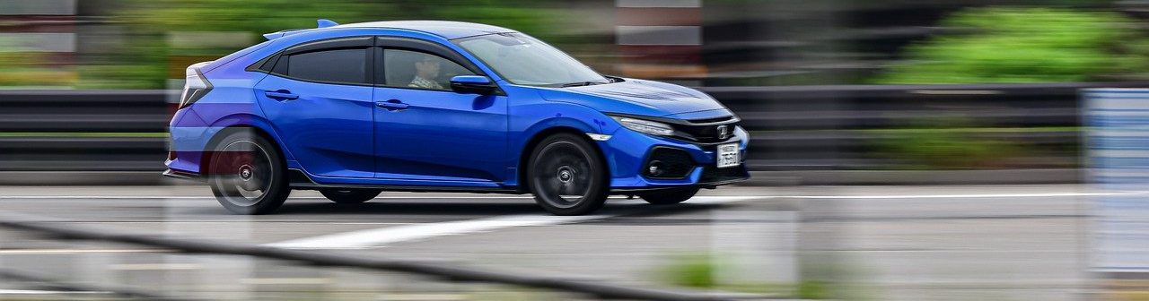 Honda Civic driving - Toyota vs. Honda concept image